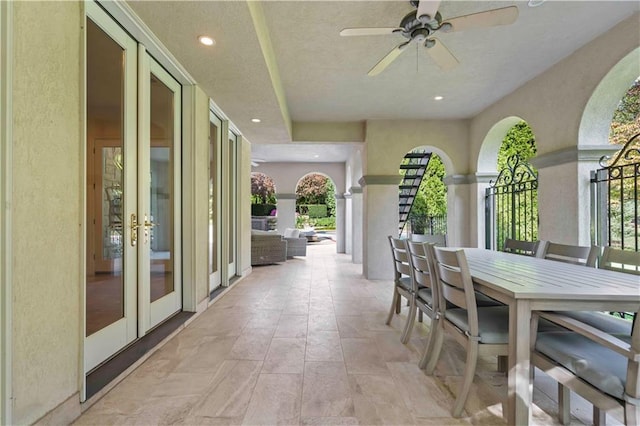 exterior space featuring french doors and ceiling fan