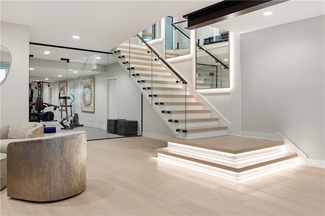 12303 W 167th Ter, Overland Park, KS 66221 - staircase featuring wood finished floors, baseboards, and recessed lighting