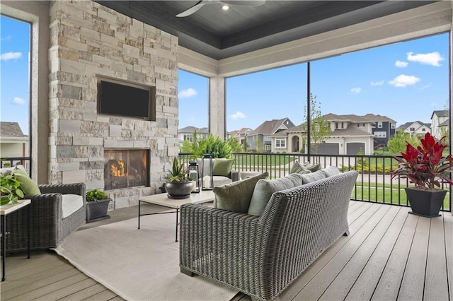 12303 W 167th Ter, Overland Park, KS 66221 - wooden terrace featuring an outdoor stone fireplace, a residential view, and a ceiling fan