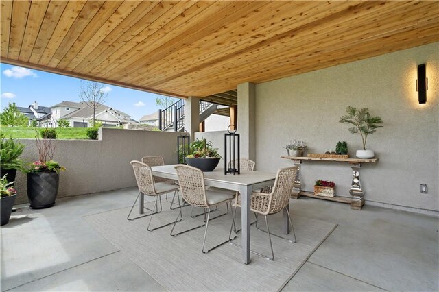 12303 W 167th Ter, Overland Park, KS 66221 - view of patio / terrace featuring outdoor dining space and stairs