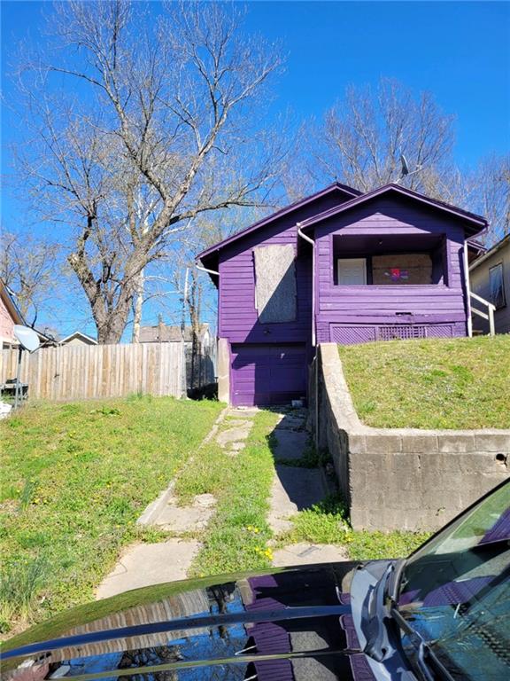 exterior space with a front yard