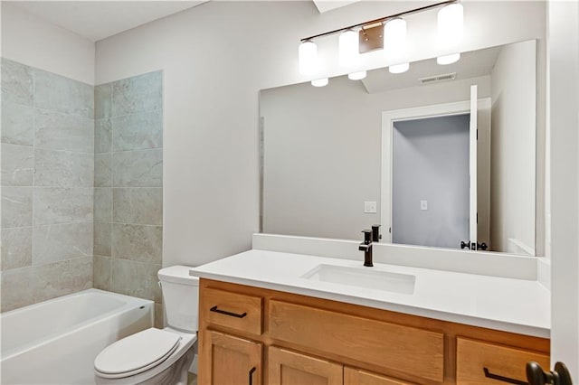 full bathroom with  shower combination, visible vents, vanity, and toilet