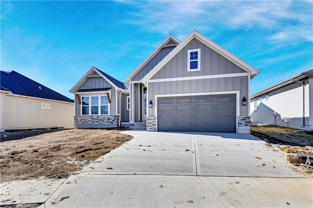 view of front facade featuring driveway and board and batten siding