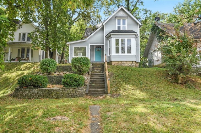 view of front of home featuring a front lawn