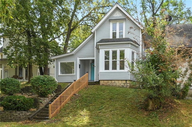 view of front of home with a front lawn