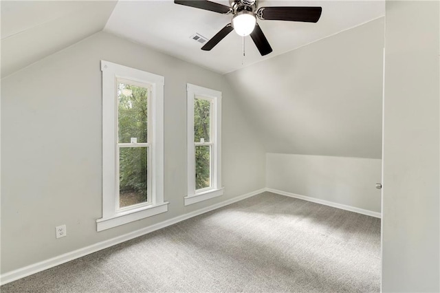 bonus room featuring carpet, vaulted ceiling, and ceiling fan