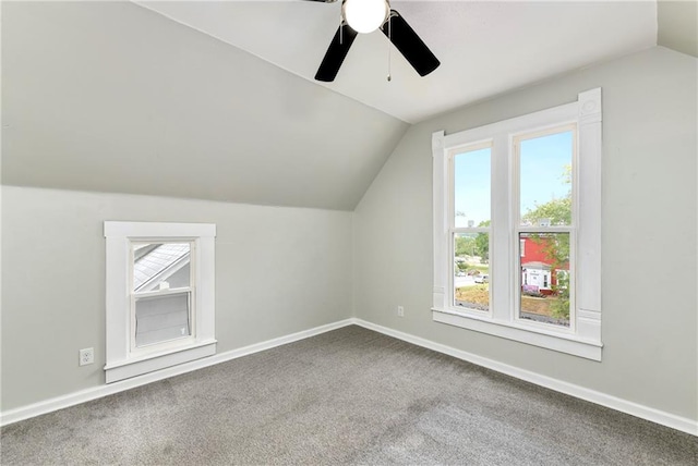 bonus room with carpet, vaulted ceiling, and ceiling fan