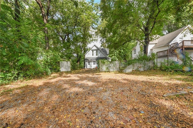 view of yard with a deck