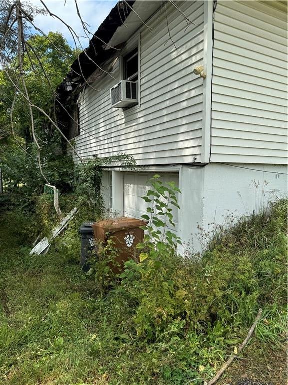 view of property exterior featuring cooling unit