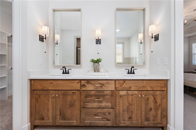 bathroom with vanity and a wealth of natural light