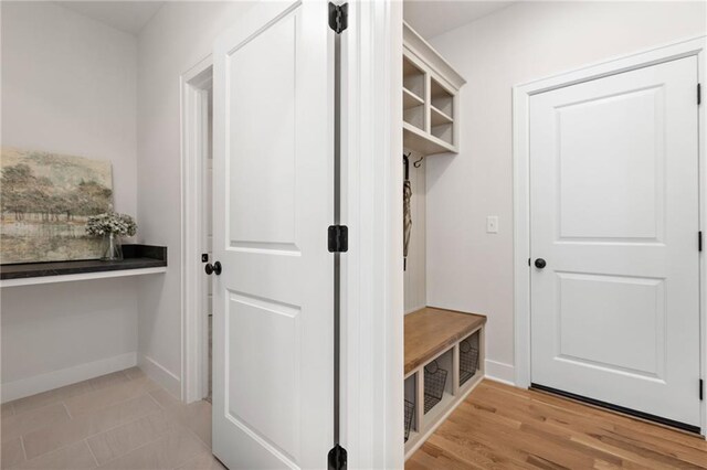 mudroom with light wood-type flooring