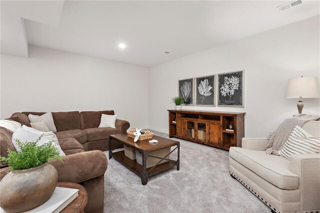 living room with light colored carpet