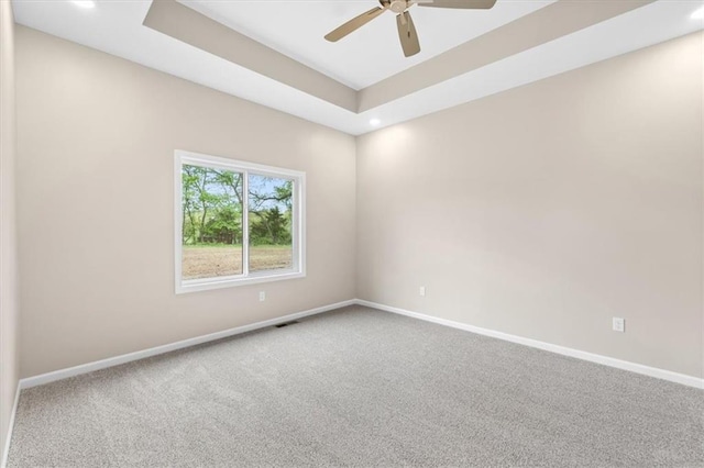 empty room with ceiling fan, visible vents, carpet floors, baseboards, and recessed lighting