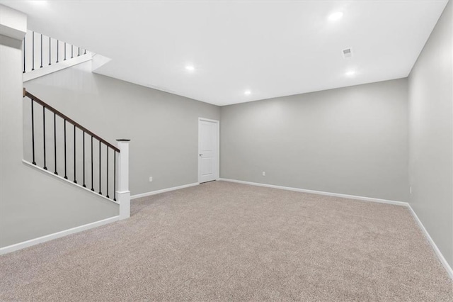 interior space featuring stairway, baseboards, carpet flooring, and recessed lighting