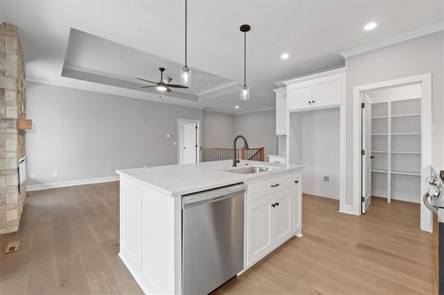 25026 W 94th Ter, Lenexa, KS 66227 - kitchen featuring stainless steel dishwasher, a sink, a ceiling fan, a tray ceiling, and white cabinets