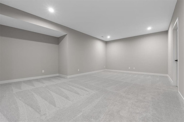 25026 W 94th Ter, Lenexa, KS 66227 - finished below grade area with recessed lighting, light colored carpet, and baseboards