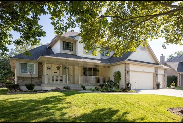 view of front of property with a front yard, a porch, and a garage