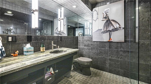 full bath featuring tile walls, toilet, and vanity