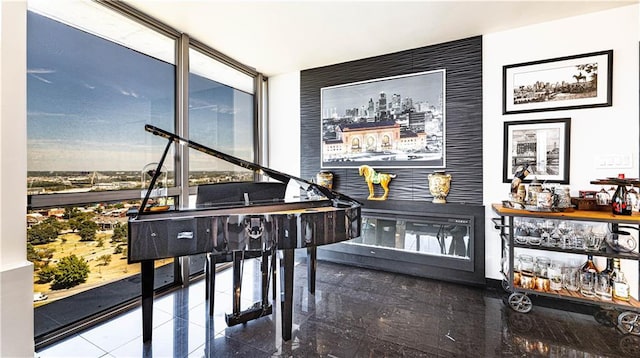 living area featuring granite finish floor