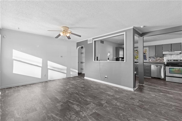 unfurnished living room with a textured ceiling, ceiling fan, and crown molding