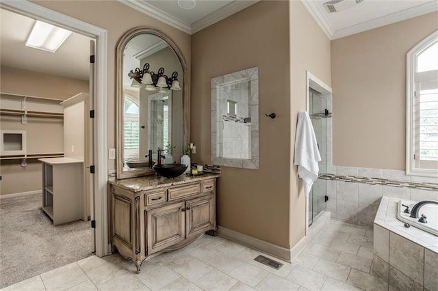 bathroom featuring vanity, shower with separate bathtub, tile patterned flooring, and crown molding