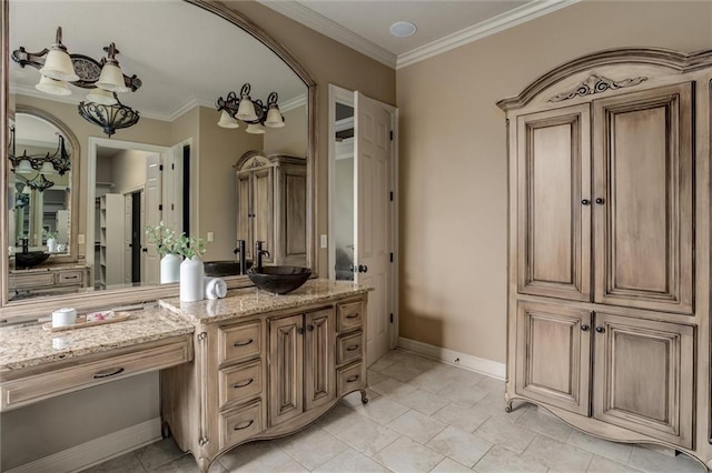 bathroom with vanity and ornamental molding