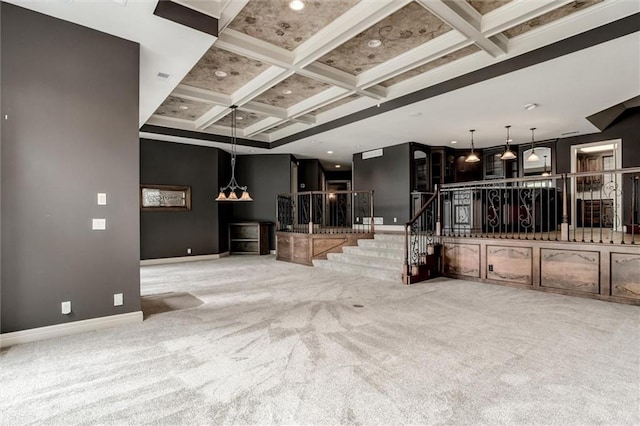 carpeted living room with beamed ceiling and coffered ceiling