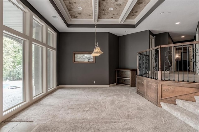 interior space featuring light colored carpet and beam ceiling