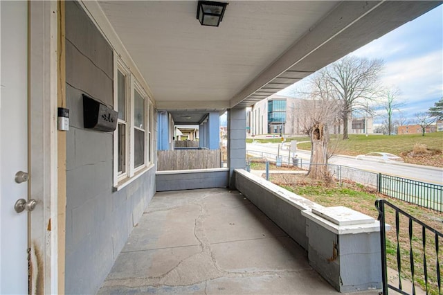 view of patio / terrace featuring fence