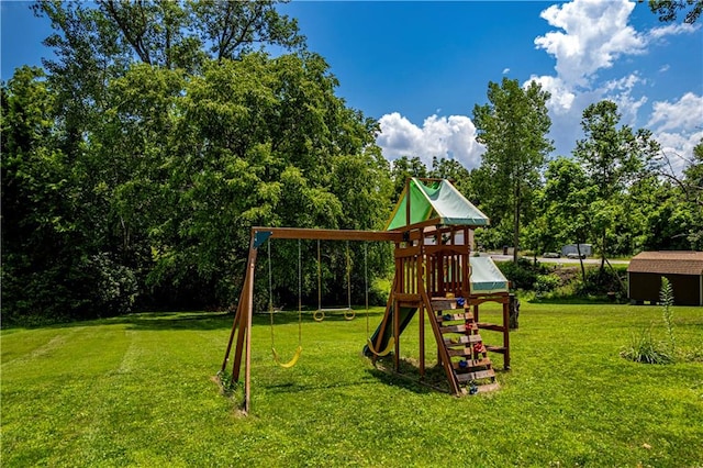 view of jungle gym featuring a lawn