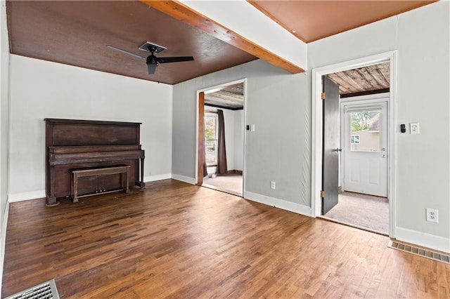 interior space featuring a wealth of natural light, wood-type flooring, and ceiling fan