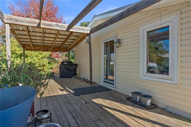 wooden deck with grilling area