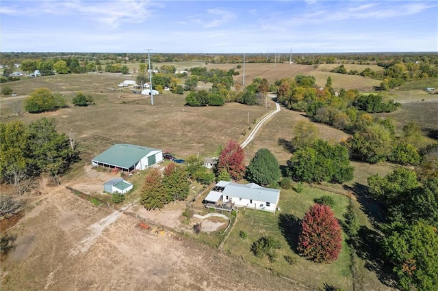 birds eye view of property featuring a rural view