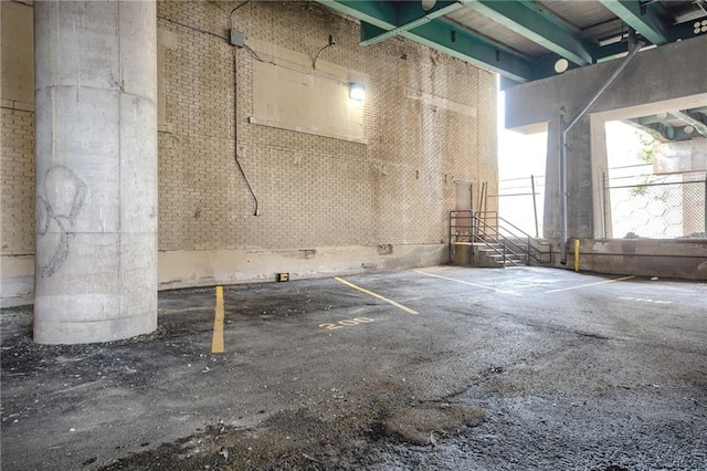 miscellaneous room with a towering ceiling