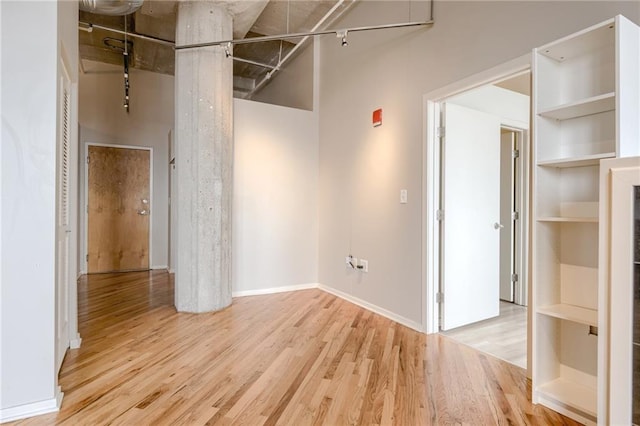 spare room featuring light hardwood / wood-style flooring