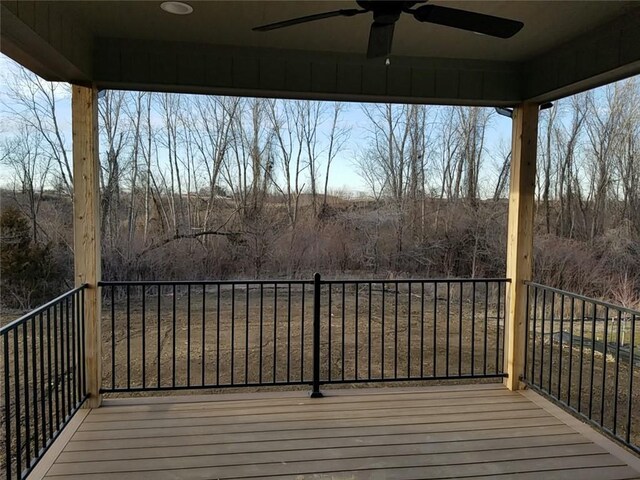 wooden terrace with ceiling fan