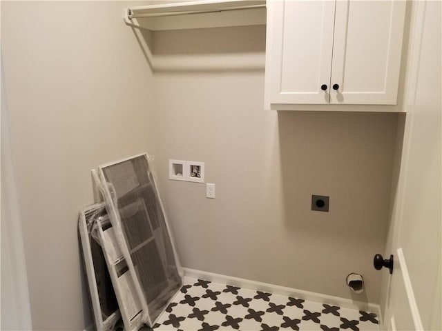 laundry area featuring cabinets, hookup for a washing machine, and electric dryer hookup