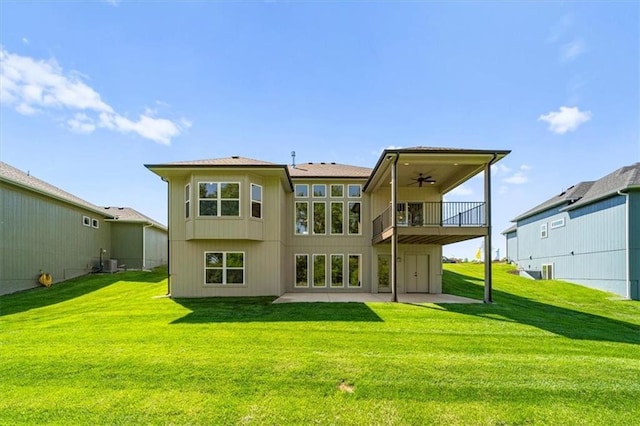 14566 Aurora Ln, Basehor, KS 66007 - rear view of property with ceiling fan, a patio area, a yard, and cooling unit