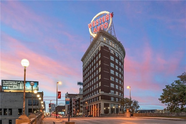 view of outdoor building at dusk