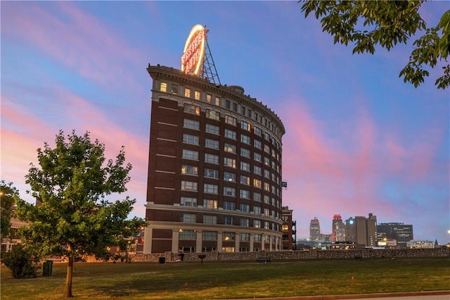 view of outdoor building at dusk