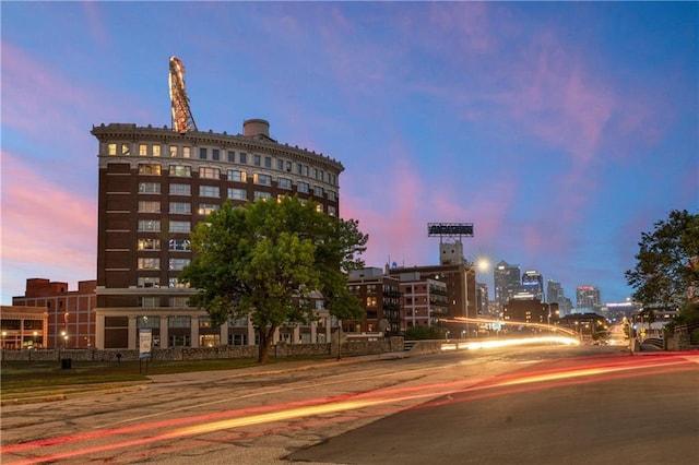 view of outdoor building at dusk