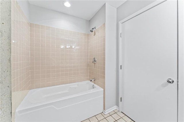 bathroom with tile patterned flooring and tiled shower / bath combo