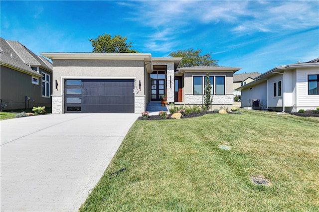 25110 W 98th Pl, Lenexa, KS 66227 - prairie-style home with an attached garage, stone siding, and stucco siding