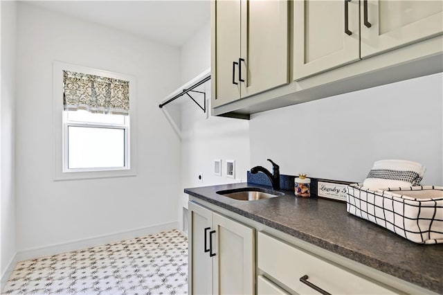 25110 W 98th Pl, Lenexa, KS 66227 - washroom with washer hookup, hookup for an electric dryer, cabinet space, and tile patterned floors