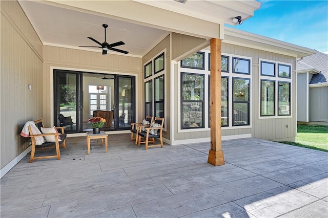 view of patio featuring ceiling fan