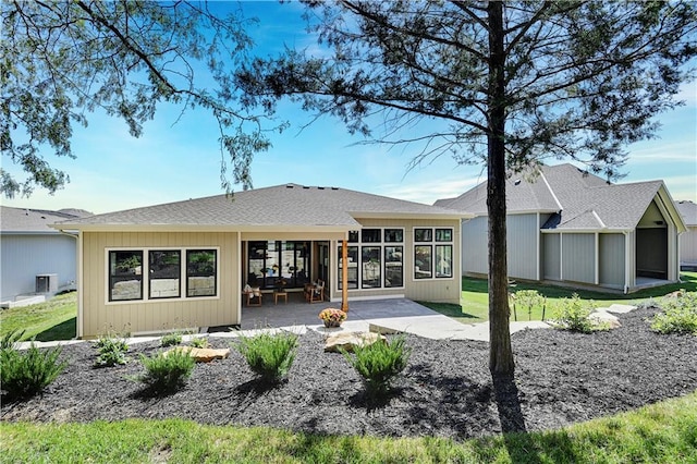 25110 W 98th Pl, Lenexa, KS 66227 - back of property featuring a patio and a sunroom