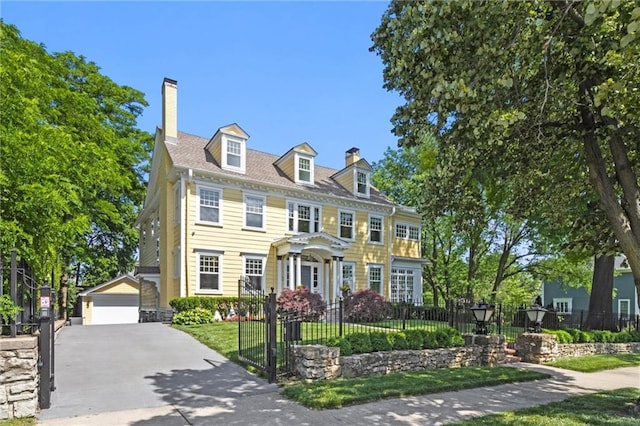 colonial house featuring a garage