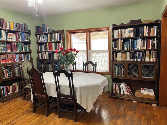 dining space featuring wood finished floors