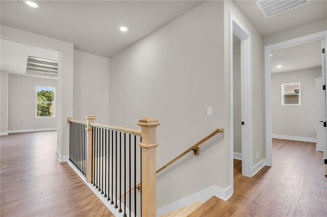 corridor featuring hardwood / wood-style flooring