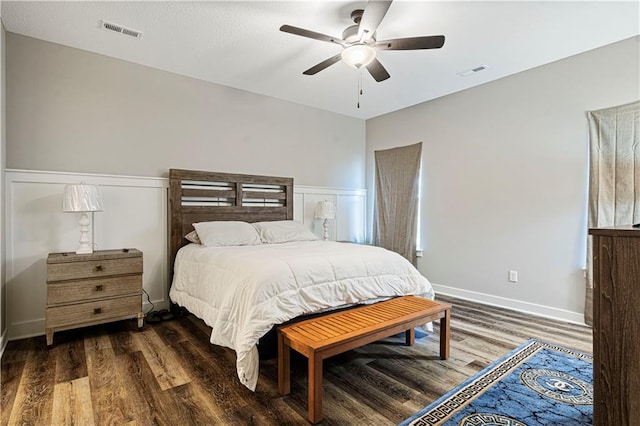 bedroom featuring dark hardwood / wood-style floors and ceiling fan